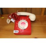 Red and White Vintage Dial Telephone