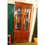 Glazed Yew wood display cabinet with key and shelves