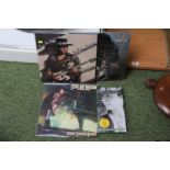 Collection of Stevie Ray Vaughan Vinyl Records and a 3 Album CD Set