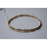 Ladies 9ct Gold (Tested) wavy design bangle 11g total weight