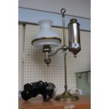 Antique Lucas Cadet Garda cycle lamp and a Late 19thC Brass Silver plated Library Oil Lamp