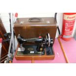 Cased Singer Sewing machine EJ933341