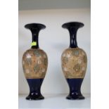 Pair of Doulton Slaters hour glass design vase with incised decoration on cobalt blue glazed base.