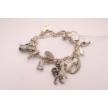 Ladies Silver Charm bracelet 40g total weight