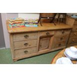 Long Stripped pine sideboard of kennel design with brass drop handles 175cm in Length