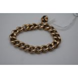 Gents Gold Curb bracelet marked 15ct 35g total weight