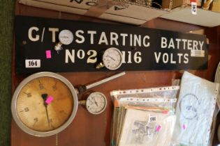 Collection of Pressure and Temperature Gauges and a G/T Starting Battery No.2 116 Volts Sign