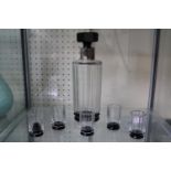 1930s clear and black glass art deco decanter and shot glass set with silver plated collar.