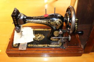 Mahogany cased Singer Sewing machine R303377