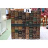 Antique Huntley & Palmers biscuit tin in the form of eight bound books.