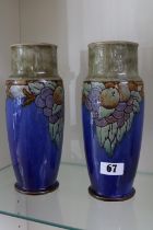 Pair of 1930s Royal Doulton Lambeth Hythe marked tall vases with grape and apple decoration signed