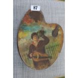 Antique Huntley & Palmers biscuit tin in the form of an artists pallet also depicting an artist at