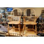 Pair of Good quality Shaker style elbow chairs with carved seat and crinoline stretcher - some