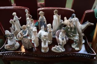 Good Collection of Lladro & Nao Figurines to include Horses, Girl with puppies, Geese etc