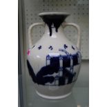 Early 20th century large delft style blue & white Portland vase with oriental influenced