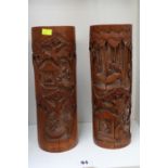 Pair of tall antique late 19th century hand carved Qing Dynasty Bitong brush pots.
