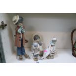 Lladro figures to include Boy with Violin, Eskimo Boy, Pierrot and a Boy with Polar Bear (4)