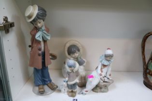 Lladro figures to include Boy with Violin, Eskimo Boy, Pierrot and a Boy with Polar Bear (4)