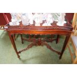 Good quality Mahogany Silver table with galleried top over pierced cruciform base