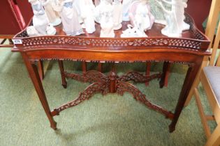 Good quality Mahogany Silver table with galleried top over pierced cruciform base