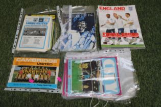 Collection of vintage football programmes to include Cambridge United, Leeds United & Leicester