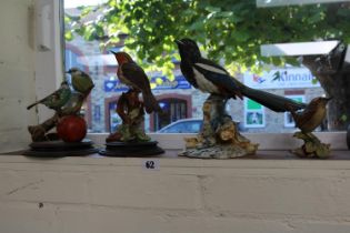 Collection of four Italian Capodimonte ceramic birds to include robin magpie etc