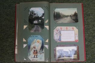 Edwardian Postcard Album with assorted Topographical and Whimsical Postcards