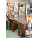 20thC Mahogany Dressing table of 9 drawers with brass drop handles