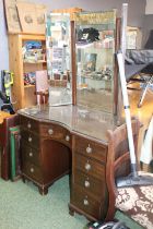 20thC Mahogany Dressing table of 9 drawers with brass drop handles