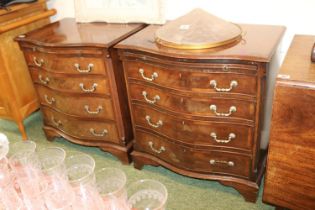 Pair of 20thC Serpentine fronted 4 drawer chests with brushing slides and brass drop handles