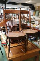 Pair of Oak American Country spindle backed chairs with turned supports