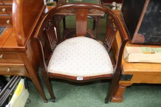 Edwardian Mahogany Inlaid Elbow chair with upholstered seat over tapering legs