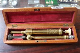 S Maw of Aldersgate London Brass Enema in fitted Oak case with brass fittings