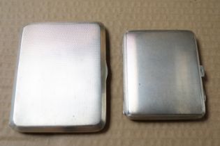 2 Good quality Silver machined cigarette cases Birmingham 1930 and Sampson Morden & Co London 1931