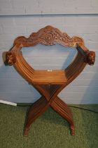 Hardwood Cruciform Throne chair with Lions head handle's and carved back