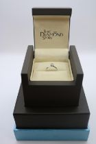 Boxed The Diamond Story 0.25ct Diamond Solitaire ring set on 18ct White Gold Size N 2.4g total