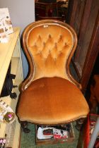 Upholstered Button back Elbow chair on fluted legs and casters