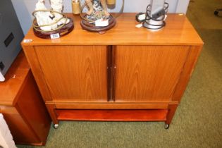 Mid Century side cabinet with tambour front over caster feet