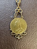 1889 Gold Sovereign in 9ct Gold mount on a Yellow metal chain 22g total weight