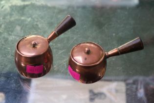 2 Copper Inkwells modelled as cooking pans with wooden tapering handles. 4.5cm in Height