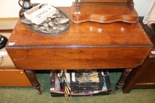 19thC Mahogany drop leaf table with turned supports and caster feet