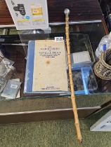 The War Diaries of Neville Duke by Norman Franks and a Bamboo swagger stick with Silver knop top
