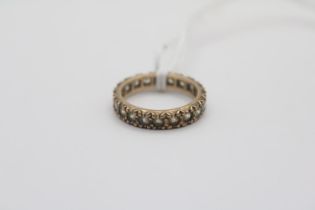 Ladies 9ct Gold Stone set Eternity ring Size M. 2.9g total weight