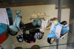 collection of 4 Model Vespa Mopeds