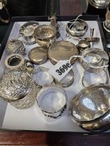 Tray of assorted Silver Napkin rings, Silver topped powder pot, Salts etc