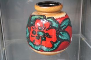 Squat West German fat lava vase with flower decoration