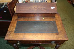 Late Victorian leather topped ladies inlayed writing desk on turned legs and casters