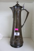 Tall early 20th century WMF Art Nouveau pewter claret jug with hall mark to base, 35cm Height.