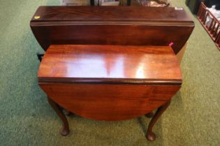 Edwardian Mahogany oval drop leaf table and a Mahogany Queen Anne style table