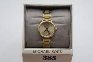 Michael Kors Ladies Gilt Stone set wristwatch with extra links and paperwork